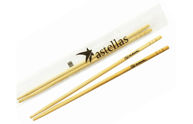 bamboo chopsticks with logo on the barrel and storage sleeve